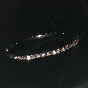 Bangle bracelet with crystals.